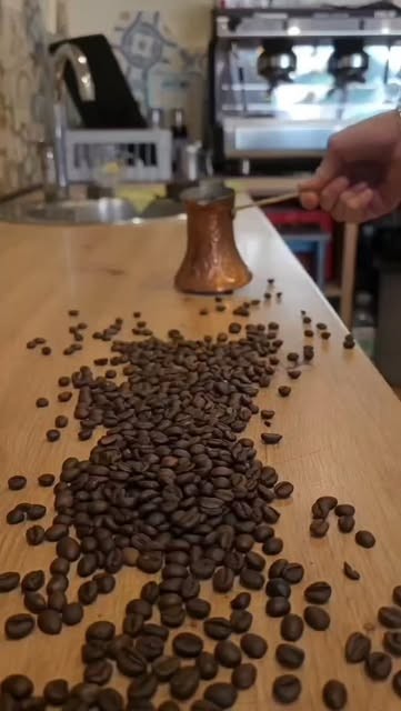 Coffee beans and a džezva on the bar at Caffe Bar Andar